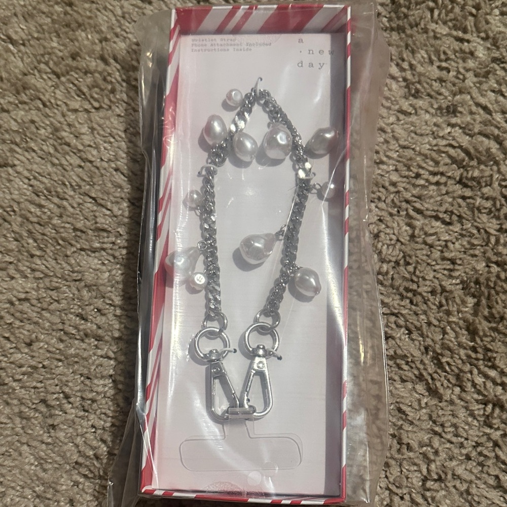 a new day Silver Pearl Wristlet Phone Holder
